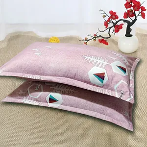 Pair of modern minimalist pink pillowcases featuring white tree and geometric patterns