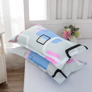 Pair of modern minimalist pillowcases featuring light blue and pink geometric patterns