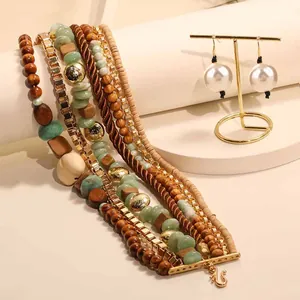 Handmade bohemian multi-strand necklace with wood beads and matching pearl earring set