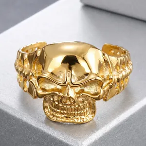 Macro view of a punk style golden skull bracelet crafted from high-quality stainless steel