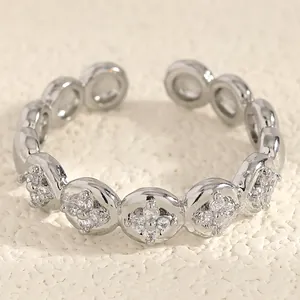 Elegant silver stainless steel open ring with sparkling cross-shaped zircon details