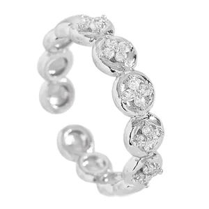 Detailed view of an adjustable stainless steel ring featuring sparkly zircon flower patterns