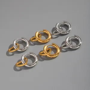 Minimalist stainless steel hoop earrings in polished gold and silver finishes for women