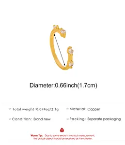 Detailed view of the 1.7cm diameter gold-plated copper open ring with zircon stones