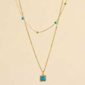 Bohemian double-layered gold necklace with turquoise beads and square pendant
