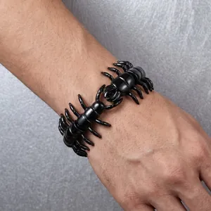 Close-up of black punk centipede bracelet made of titanium steel on wrist