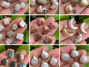Detailed view of various baroque freshwater pearls with gold edges for jewelry making