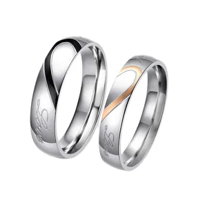 Minimalist stainless steel couple rings with heart puzzle design and Love engraving