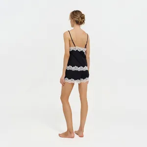 Elegant French style black satin pajama set with white lace trim camisole and shorts