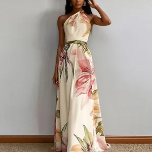 Elegante abito lungo con scollo all'americana, stampa floreale e vita alta con laccio