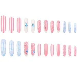 Detailed view of assorted sea star and striped nautical patterns on press-on false nails
