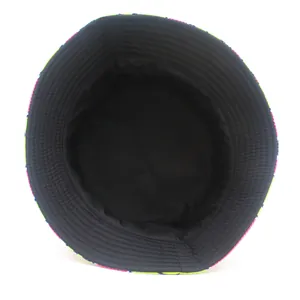 Interior view of cartoon duck print bucket hat with black lining and brim stitching