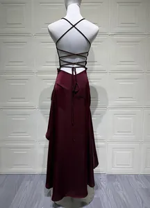 Back view of a sexy burgundy satin dress with elegant criss-cross strappy back design