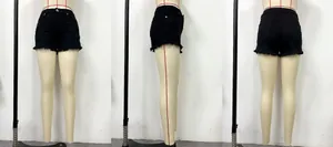 Front, side, and back views of black low-waist distressed denim shorts with frayed hems