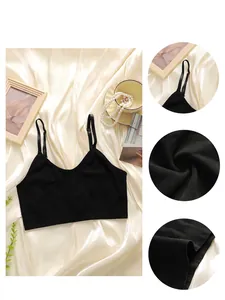 Close-up view of a black seamless camisole with fabric texture and shoulder strap details.