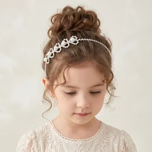 Elegant children's princess crown headband featuring heart rhinestones and pearls for parties