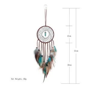 Handmade dream catcher with turquoise pendant and blue feathers for wall decor