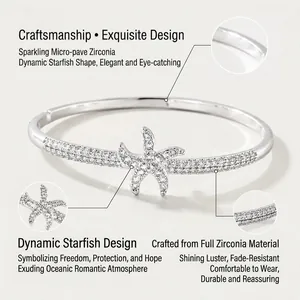 Elegante bracciale rigido a stella marina argentata con pavé di zirconi scintillanti.