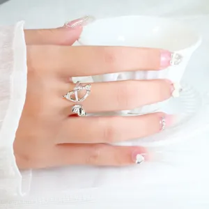 Elegant silver zircon hollow butterfly ring with asymmetrical wing design for women