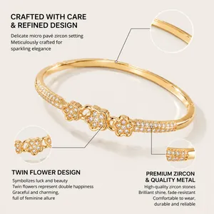 Vue macro des pierres de zircon sur un bracelet jonc doré au design floral raffiné