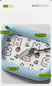 Detail view of breathable pet cooling mat with cute rabbit patterns and smooth ice silk fabric.