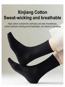 Close-up of men's breathable black ribbed cotton socks showing premium fit and soft texture