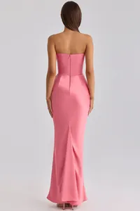 Back view of elegant pink strapless satin mermaid evening dress with boned bodice