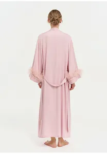 Back view of a pink acetate long robe featuring luxurious ostrich feather trimmed cuffs.