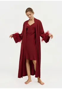 Elegant burgundy satin robe featuring luxurious ostrich feather cuffs for women.