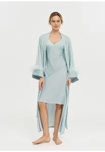 Elegant light blue silk satin robe set with luxury ostrich feather trimmed cuffs.