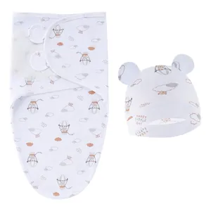 Couverture d'emmaillotage pour nouveau-né et bonnet assorti avec montgolfières