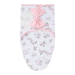 Gigoteuse emmaillotage nouveau-né confortable avec nœud rose et motif de lapin floral