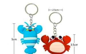 Detailed dimensions of cartoon lobster and crab silicone keychains with metal rings