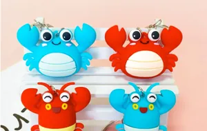 Set of cute 3D cartoon crab silicone keychains for bags or keys in red and blue