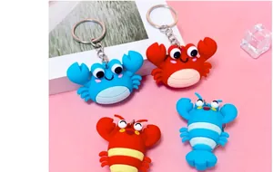 Front view of colorful 3D cartoon crab and lobster silicone keychains