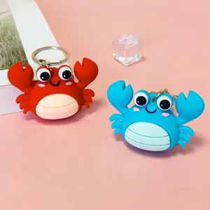 Cute 3D cartoon silicone crab keychains in vibrant red and blue for bags and gifts