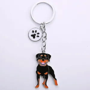 Detailierter Metall-Schlüsselanhänger mit Rottweiler-Hund und Pfotenabdruck-Anhänger