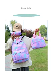 Detail shot of a three-piece backpack set featuring a purple tie-dye starry heart pattern