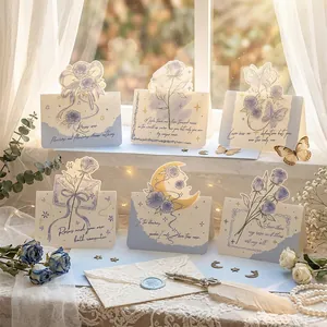 Detailed view of six floral pop-up Valentine's Day greeting cards with romantic quotes