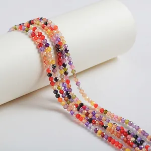Close-up of multi-colored faceted cubic zirconia loose beads for jewelry making.