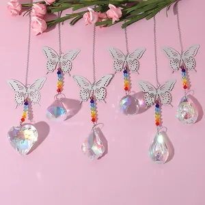 Set of silver butterfly suncatchers with rainbow beads and AB crystal prism pendants.
