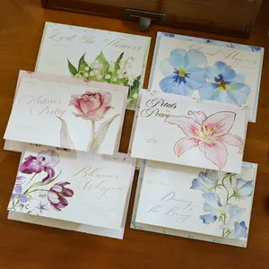 A collection of six elegant floral watercolor greeting cards with script typography