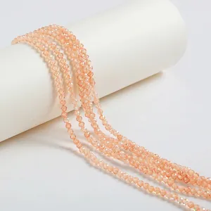 Close-up of faceted champagne zircon beads for delicate jewelry making accessories.