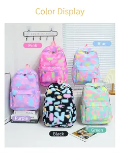 Collection of school backpacks in five vibrant colors with unique colorful cow patterns