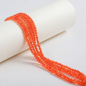 Close-up of faceted orange zircon beads for DIY jewelry making accessories