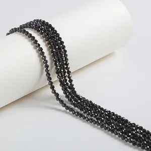 Close-up of black faceted zircon beads showing sparkling cut textures for jewelry making