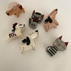 Collection of cute acetate dog and cat hair claw clips for versatile styling