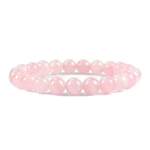 Natural 8mm rose quartz beaded bracelet for women on a professional white background