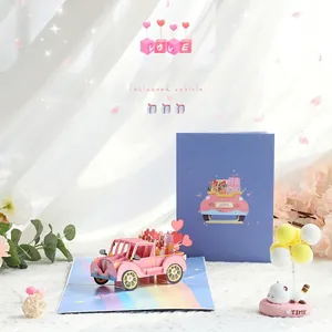 Detailed view of a 3D pop-up Valentine's greeting card with a pink flower truck