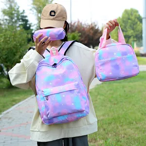 Stylish three-piece student backpack set featuring pink and blue tie-dye and star patterns